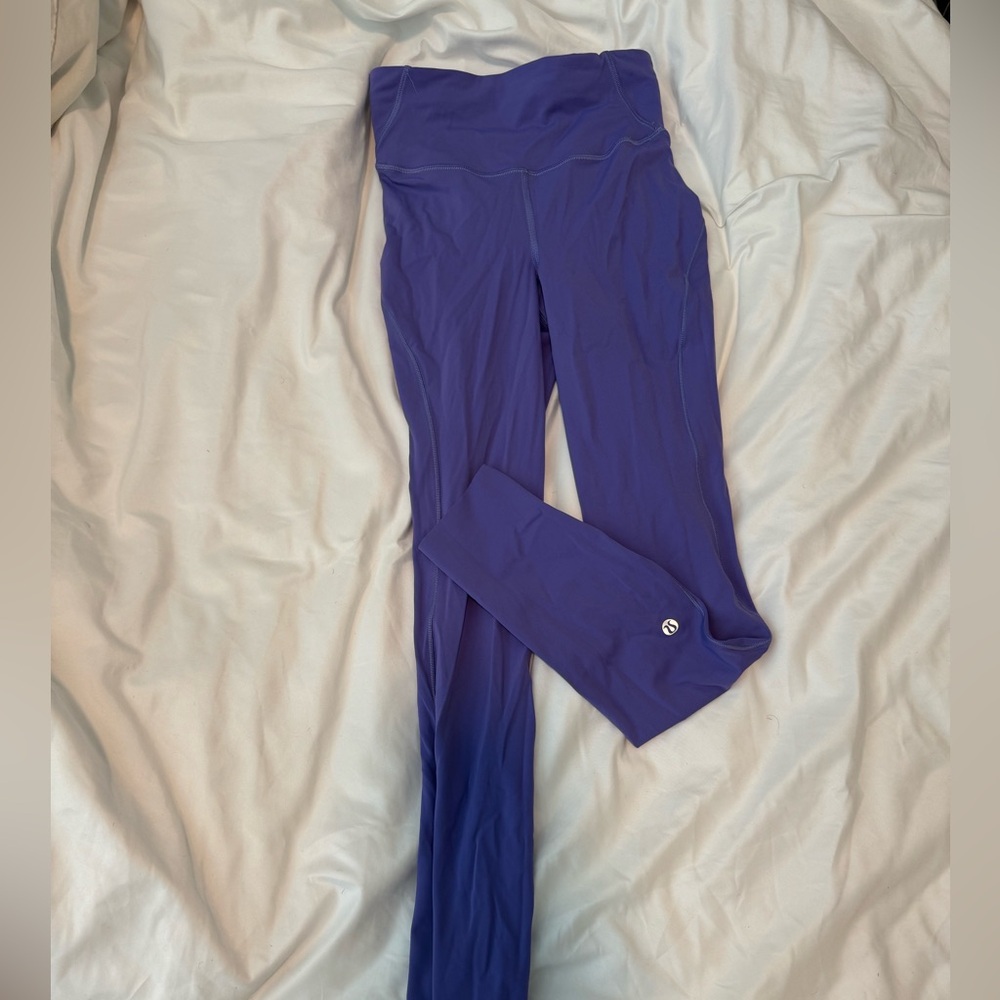 Barely worn Base Pace High-Rise Running Tight 25
Charged Indigo
Size 2